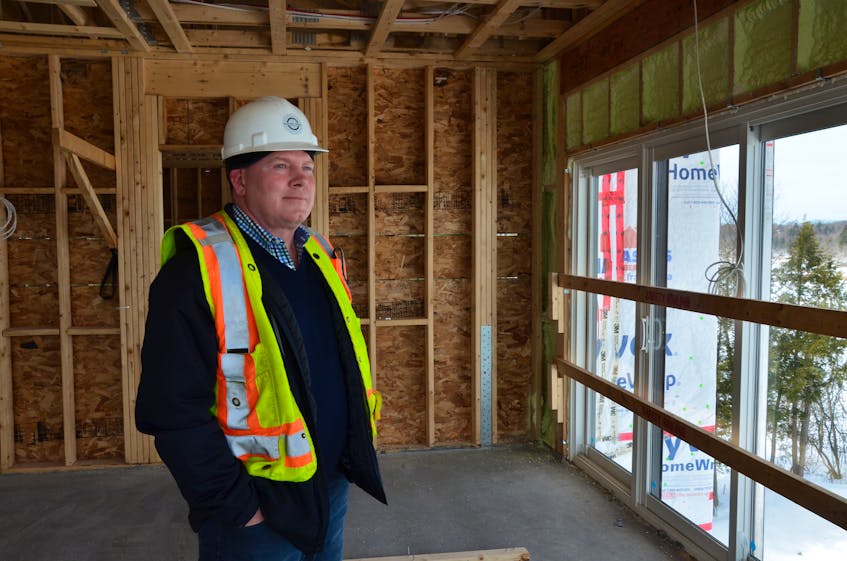 Parsons Green Developments president Noel Taiani looks out over the Cornwallis River valley from the fifth floor of a building currently under construction as part of the Miners Landing development. KIRK STARRATT