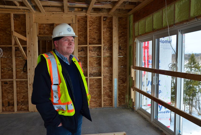 Parsons Green Developments president Noel Taiani looks out over the Cornwallis River valley from the fifth floor of a building currently under construction as part of the Miners Landing development. KIRK STARRATT
