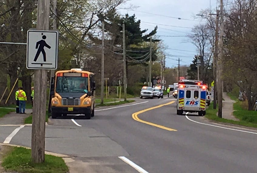No one was injured when a bus carrying Kings County Academy students visiting Acadia University for a day trip May 10 was struck by another vehicle along Main Street in Wolfville.