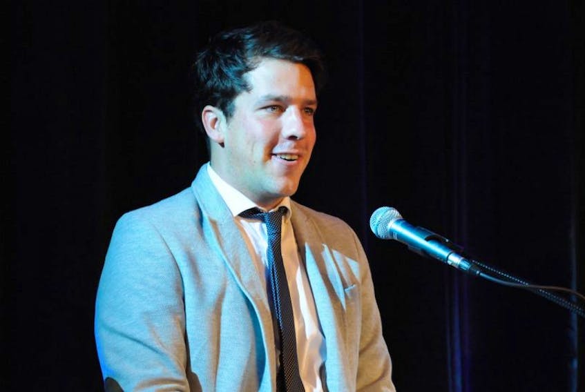 <p>Open Eats co-owner Alex Clark speaks while accepting the 2016 Greater Summerside Chamber of Commerce Business Excellence Award for New Business of the Year on Thursday at Credit Union Place.</p>