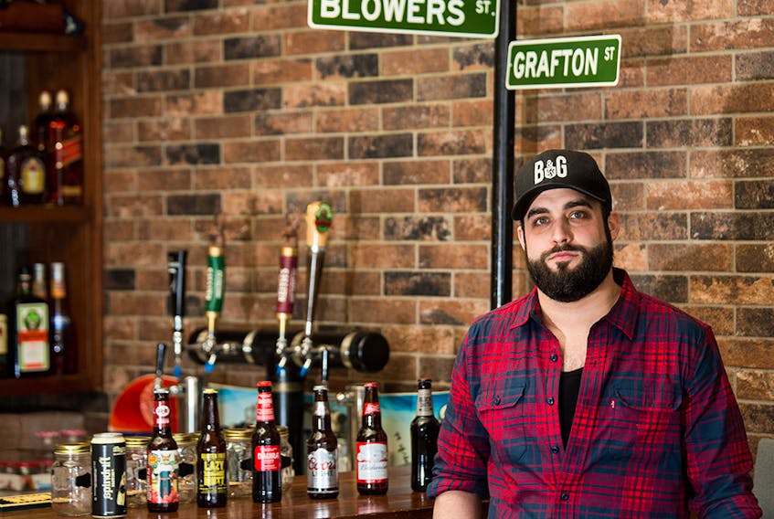 Josh Robinson, founder and owner with Blowers & Grafton, was photographed in his Calgary restaurant on April 21, 2020. The Halifax street food inspired eatery is donating all of their proceeds from orders on Tuesday to support those affected by the shooting in Nova Scotia.