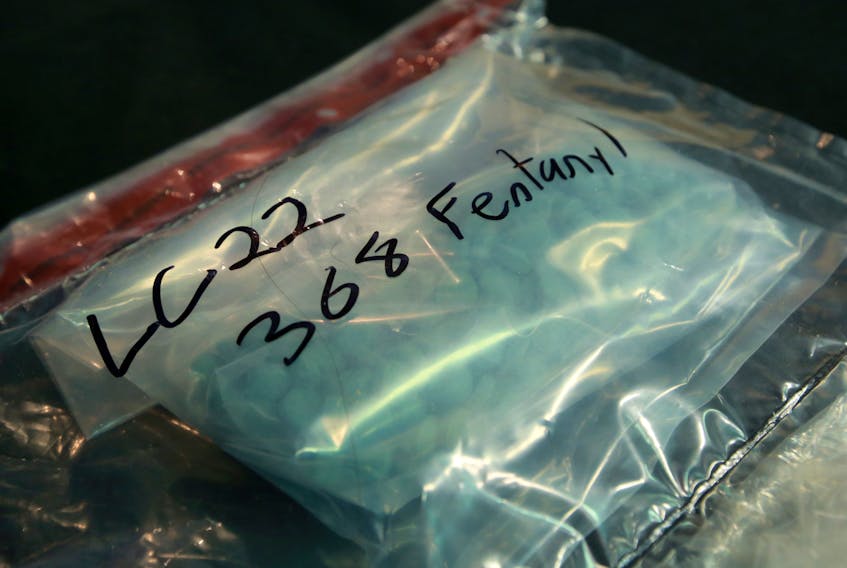 Fentanyl pills are displayed as evidence during a press conference about a fentanyl and counterfeit currency manufacturing lab that was busted in Evanston in September. Gavin Young/Postmedia