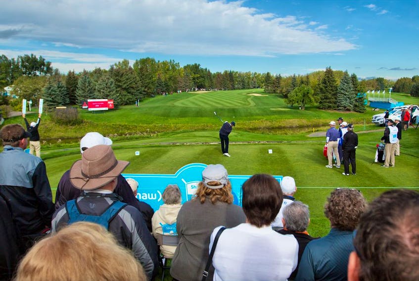 Fans watch as players tee off on the first hole in Round 1 of the Shaw Charity Classic at the Canyon Meadows Golf Club in Calgary on Friday September 2, 2016. Gavin Young/Postmedia