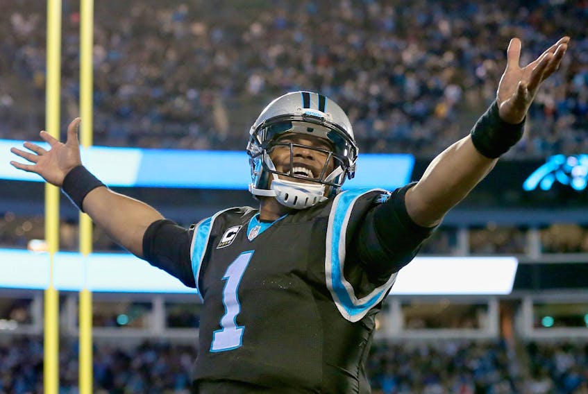 Cam Newton of the Carolina Panthers reacts after a touchdown against the Tampa Bay Buccaneers during their game at Bank of America Stadium on January 3, 2016 in Charlotte. (Streeter Lecka/Getty Images)