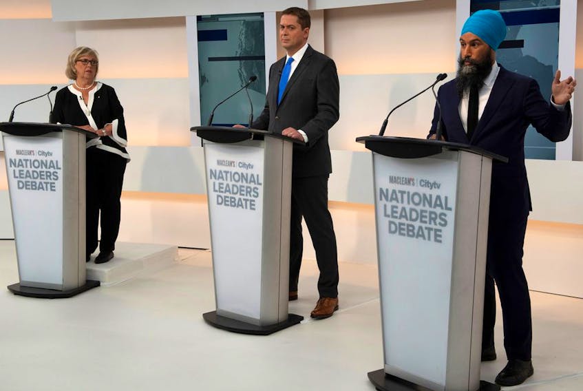 Green Leader Elizabeth May, Conservative Leader Andrew Scheer and New Democratic Party Leader Jagmeet Singh take part in the Maclean's/Citytv National Leaders Debate on the second day of the election campaign in Toronto on Thursday, Sept. 12, 2019.