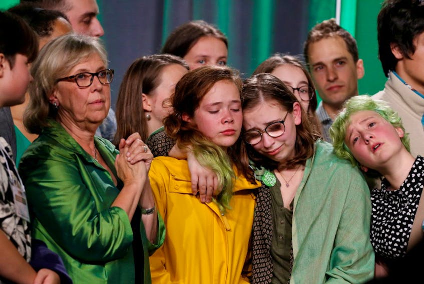  Green Party leader Elizabeth May reacts alongside supporters after the federal election in Victoria, British Columbia, Canada October 21, 2019.