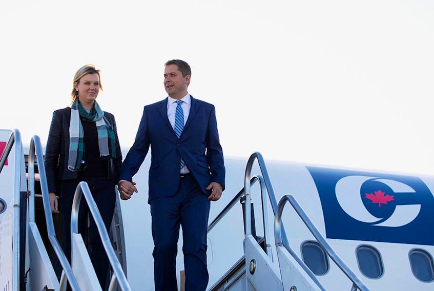 Leader of Canada's Conservatives Andrew Scheer and his wife Jill arrive for the campaign stops for the upcoming election, in Hamilton, Ontario, Canada October 8, 2019.  
