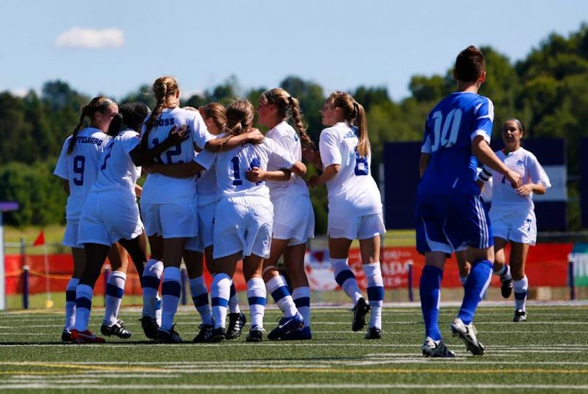 Team Nova Scotia celebrates Axewomen recruit Katie Ross (centre) goal on a penalty kick in their 5-1 win over Alberta Aug. 5 at the Canada Games.