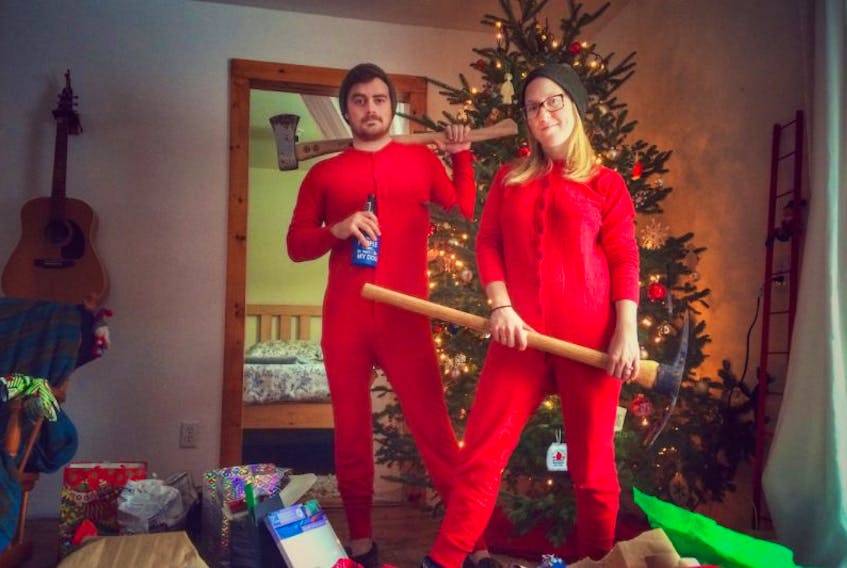 Jon Riley and Claire Maybee of Tatamagouche ask what is more Canadian than opening your gifts with the same axe you used to cut down your Christmas tree.
