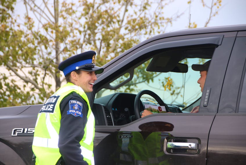 Const. Wendy Cormier was among the Truro Police officers to take part in a check-stop on Marshland Drive recently. Officers were handing out information on cannabis to drivers.