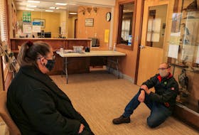 Sheila Christie and Scott Sharplin participate in a provincewide sit-in in solidarity with Jacob Fillmore's hunger strike, at the Department of Lands and Forestry office in Coxheath, Nova Scotia, on Tuesday. JESSICA SMITH/CAPE BRETON POST