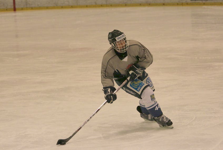 Just another guy playing hockey? Yes, well, but this guy, Wade MacQuarrie, is shown as he prepares to make a pass during his southern California senior mens hockey team's trip to Japan in 2015. The 61-year-old actuary, who now lives in Colorado, is coming back to Cape Breton to visit his parents in Alder Point and to play some hockey in the Vince Ryan Memorial Scholarship Hockey Tournament.