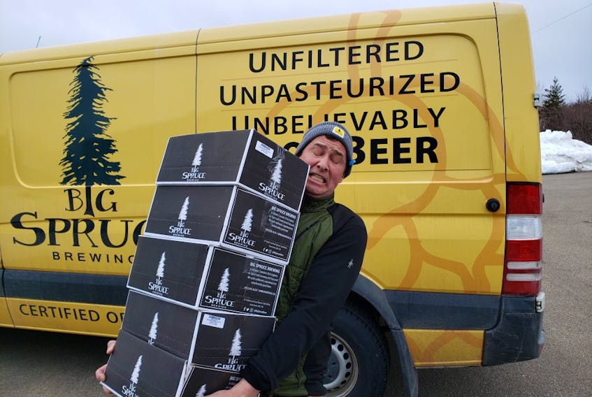 Big Spruce Brewing owner Jeremy White of Nyanza readies a batch of their signature product for shipment to all parts of Cape Breton and Canada. Door-to-door delivery is helping to keep breweries in Nova Scotia open even as social distancing measures keep their busiest consumption places closed. CONTRIBUTED/JEREMY WHITE