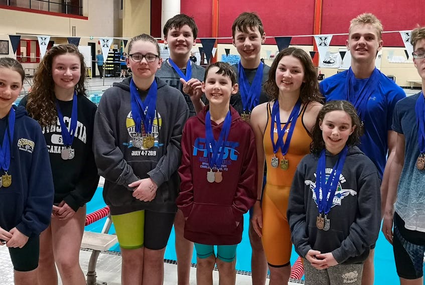 Members of the Cape Breton Dorados took part in the double-A provincial swimming championships recently in Antigonish. The local swimmers were successful in taking medals back to Cape Breton. Pictured are members of the team. Front row, from left, Hazel Clark, Becca Morrison, Lexie Quinn, Winston Clark, Anna Morrison and Allison Giorno. Back row, from left, Braydon Hunter, Duncan Clark, Ryan Lemonie and Warren McArthur. PHOTO SUBMITTED/STACY CLARK