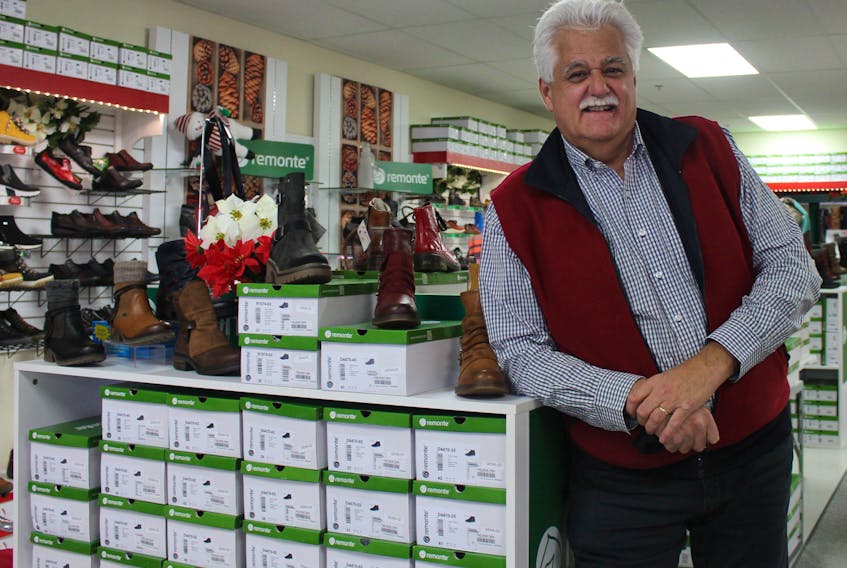 Bruce Meloney is shown at his Rieker By The Shoe Tree location on Charlotte Street. The store is up for sale, signalling the end of 120 years in the shoe business for his family. GREG MCNEIL/CAPE BRETON POST