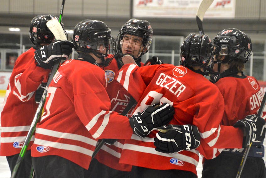 Members of the Cape Breton Jets celebrate a goal during Nova Scotia Under-16 'AAA' Hockey League action at the Membertou Sport and Wellness Centre earlier this year. The Jets and the Port Hawkesbury-based Cabot Highlanders will begin the league playoffs this weekend on the road. JEREMY FRASER • CAPE BRETON POST