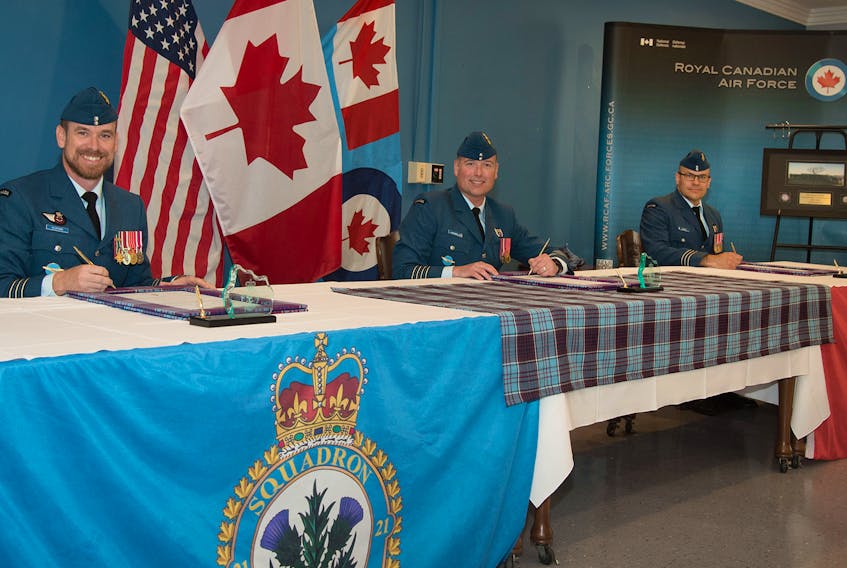 Lt.-Col. Joseph Olford, from left, Col. Mark Lachepelle and Lt.-Col. Richard Jolette at the changing of the command ceremony of 21 Aerospace Control and Warning Squadron on June 26. Olford, originally from Point Edward, is excited to be taking over command of the squadron which controls and watches Canadian airspace and said it's one of his many military career highlights. CONTRIBUTED/CANADIAN ARMED FORCES