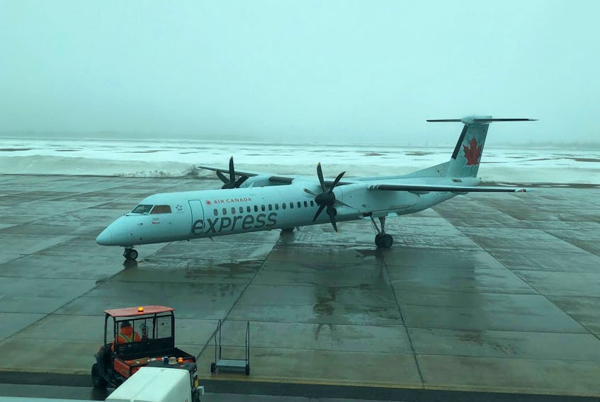 An Air Canada Express plane sits on the tarmac at the J.A. Douglas McCurdy Sydney Airport on March 31, 2020. The airline announced last week its plans to suspend its Sydney-Halifax route for the month of November, and that has caused concern in the local business community about the continued viability of the airport. CONTRIBUTED