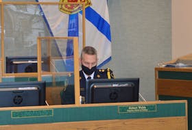 Cape Breton Regional Police acting Police Chief Robert Walsh prepares to go through the police department's budget on Monday at city hall council chambers. IAN NATHANSON/CAPE BRETON POST