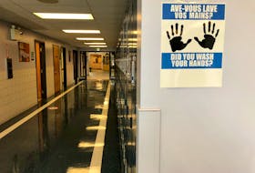 Signs promoting hand washing, like this one, are found throughout Sherwood Park Education Centre and other schools across the province. In the Cape Breton Regional-Victoria Centre for Education these signs are in three languages; English, French and Mi'kmaq. NICOLE SULLIVAN/CAPE BRETON POST 