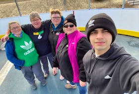A group of volunteers removed graffiti from the boards of the New Waterford Rotary Club outdoor ball hockey arena Sunday afternoon. From left are Krysta Watts, Theresa Rowe, Kayla Williams, Alexis Pertus and Saiyam Kesar. SUBMITTED/THERESA ROWE
