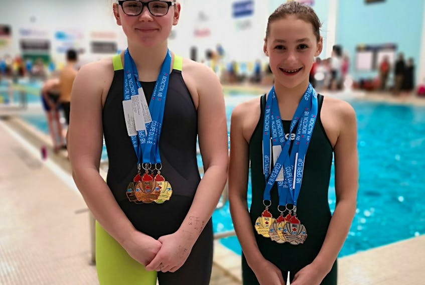 A pair of Cape Breton Dorados turned in top times at the New Brunswick Open Cup swim meet recently. Hazel Clark placed first place in both the 12-and-under 100-metre and 200-metre freestyle. She also finished second in the 12-and-under 100-metre and 200-metre backstroke. Lexie Quinn took home the gold medal in the female 13-14-year-old 50-metre and 100-metre freestyle. She won silver in the female 12-14 50-metre backstroke and the 13-14 200-metre individual medley. Quinn was also successful in capturing a bronze medal in the 13-14 100-metre butterfly. From left, Quinn and Clark. CONTRIBUTED/STACY CLARK