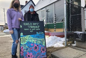 Taylor McLellan, left, a worker at the Ally Centre of Cape Breton, and Ronald Jackson outside the centre in Sydney this week. Jessica Smith • Cape Breton Post