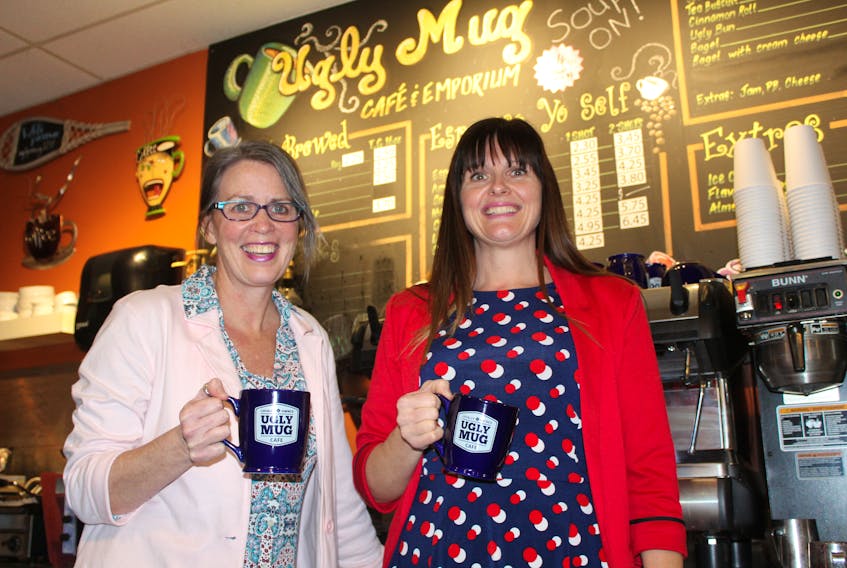 Lori Latimer-Merlin, left, and Tracey Hanratty are owners of the Ugly Mug Cafe in Sydney River. After eight years in business, they have decided to sell. GREG MCNEIL/CAPE BRETON POST