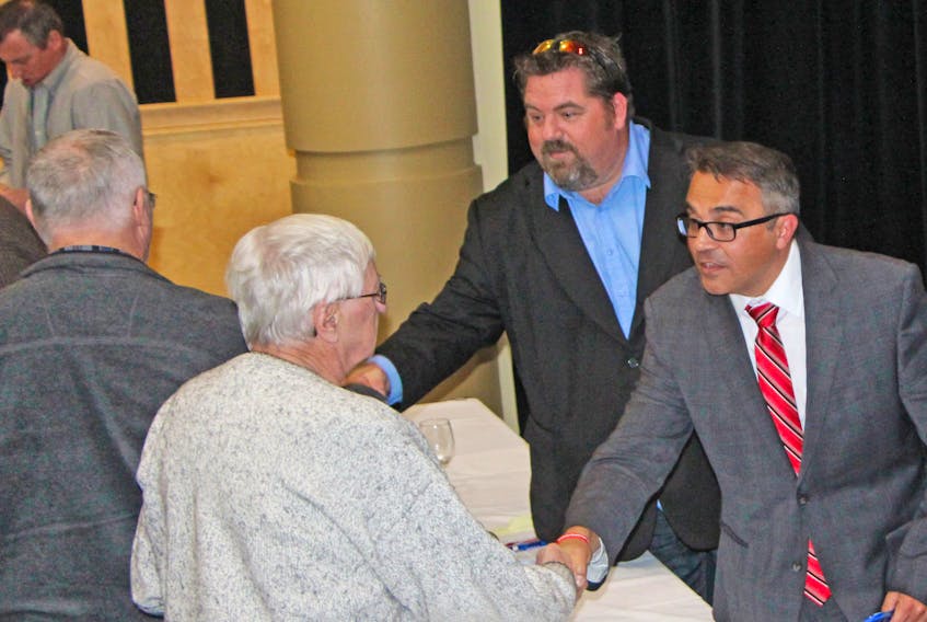 Cape Breton-Canso candidates, including Billy Joyce (left) of the People’s Party of Canada and Liberal Mike Kelloway, greeted and spoke with constituents after an Oct. 7 debate. Corey LeBlanc