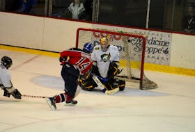 Mike MacIssac scores the winning goal in double overtime to give the Summerside Western Capitals to the 2009 Fred Page Cup Eastern Canadian junior A hockey championship in Moncton, N.B. MacIsaac’s goal lifted the Caps to a 3-2 win over the host Dieppe Commandos in the final.