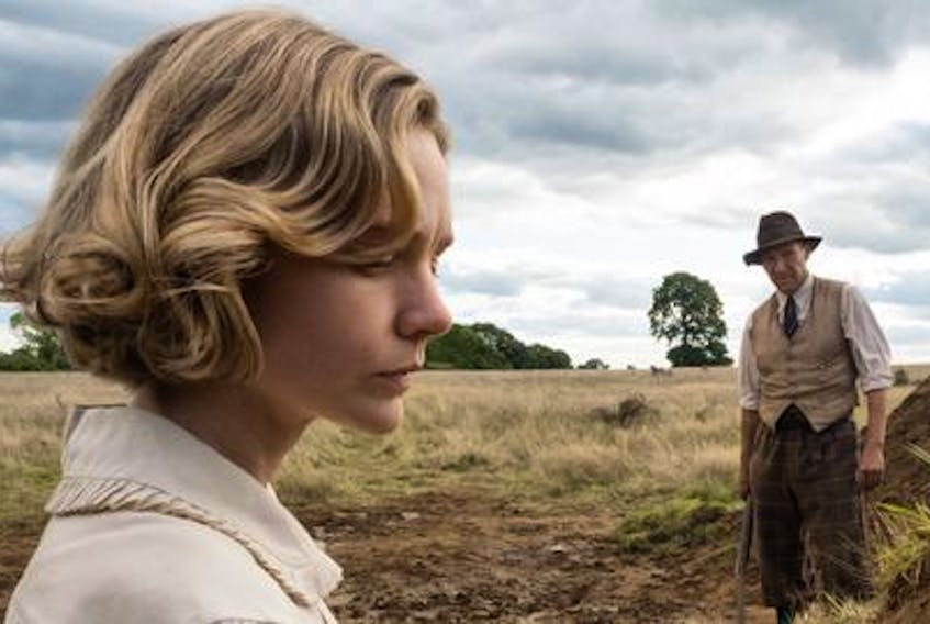 Carey Mulligan and Ralph Fiennes star in the movie The Dig. - Netflix