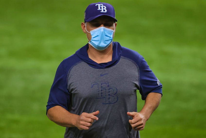 Tampa Bay Rays manager Kevin Cash heads back to the dugout after bringing in Nick Anderson (not pictured) to replace Blake Snell (not pictured) against the Los Angeles Dodgers during Game 6 of the World Series.