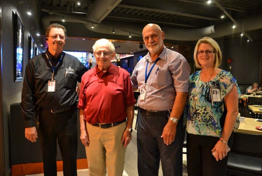 <p>Bill Jamael, second from left, is grateful that Casino Nova Scotia-Sydney staff members, Bob Monahan, left, Ian Flynn, and Gina Ryan, right, were there to provide medical assistance when he went into cardiac arrest July 20 at the casino.</p>