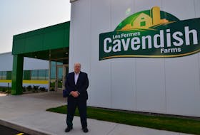 Cavendish Farms president Robert K. Irving stands in front of the new $12.5-million research centre unveiled on Thursday. 