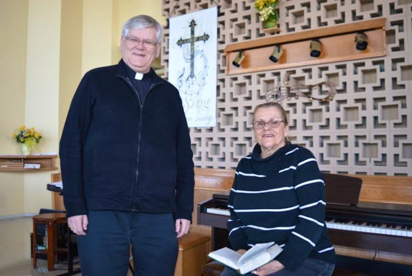 Parish priest Fr. Jim Oliver and organist and choir director Sharon Iannetti invite people of all denominations to attend the fourth annual memorial hymn sing at Holy Family Parish in Sydney Mines on Sunday.