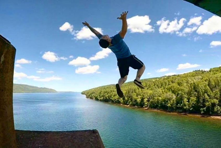 Logan LaTulippe makes his jump off Seal Island Bridge.