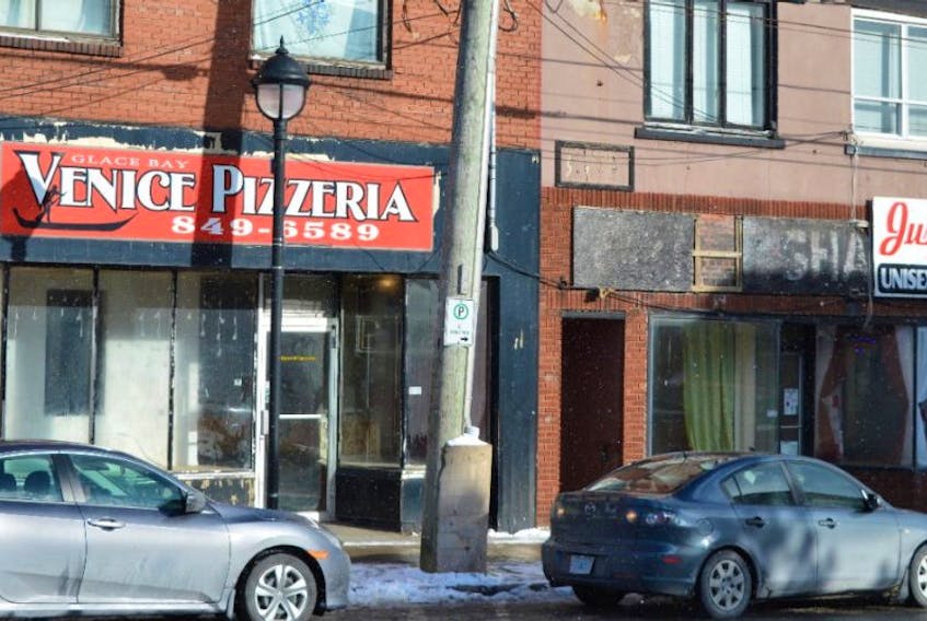 The Just Cuts building in downtown Glace Bay once housed Elliot Marshall’s clothing store while the Venice Pizzeria location was once home to his wife Helen’s store that specialized in wedding gowns. Elliot Marshall, a longtime businessman in the community, died last month in Ottawa.