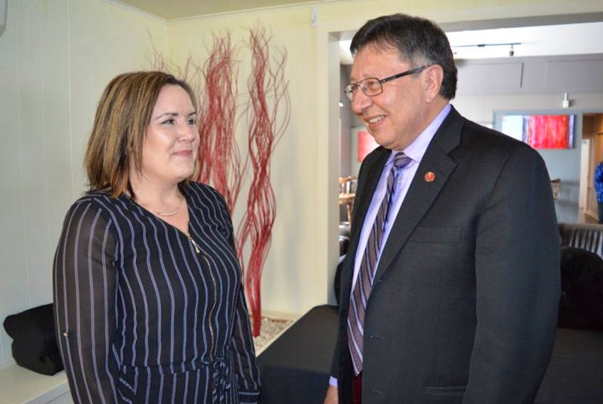 Senator Dan Christmas speaks with Rochelle Hatcher, manager of fund development with the Cape Breton Regional Hospital Foundation, after his address to the annual general meeting of the Sydney and Area Chamber of Commerce on Monday. Christmas, former senior adviser to Membertou First Nation, was named to the Senate in October, its first Mi’kmaq member.