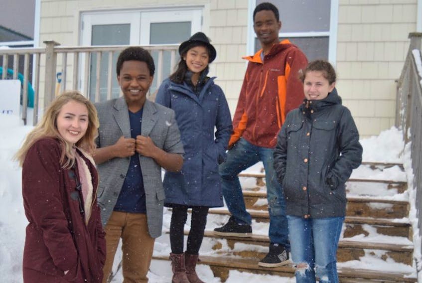 It was back to snow in Cape Breton for Munro Christian Academy high school students, from left, Kristen Snow, Ben Whyte, Alex Whyte, Joe Whyte and Anna Ritter who recently returned from a mission trip to Bolivia.
