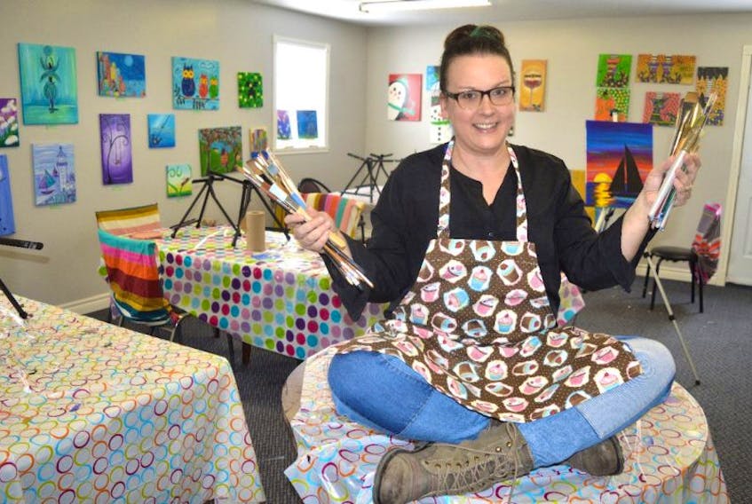 Dawn MacDonald of Glace Bay has a little fun in Dizzy’s Art Studio that she opened at 588 Main St., Glace Bay. MacDonald said it began as a space for herself to create artwork and now she offers art classes with expansion expected in the future.