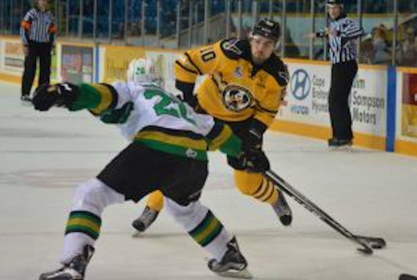 ["Dillon Boucher of the Cape Breton Screaming Eagles fires a shot on the Val-d'Or Foreurs goal during the first period of Quebec Major Junior Hockey League play Dec. 4 at Centre 200. The Eagles won 3-2 in a shootout."]