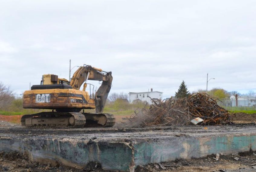 Cleanup continues at the site of the former St. Agnes School. Fire destroyed the building on Sunday, May 28.