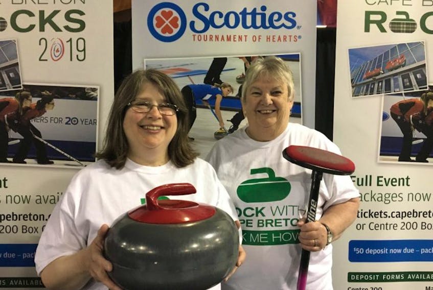 Rachel Baker, left, president of Sydney Curling Club stands for a picture with curler Louise Gillis in this file photo from last month taken at an event to announce the CBRM’s bid to host the 2019 Scotties Tournament of Hearts. The ticket package deposit deadline for the 2019 tournament is June 16. Curling Canada will conduct a CBRM site tour on Sept. 6.