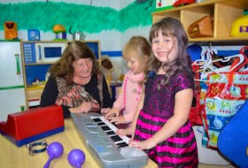 Volunteer Jacky Peach is shown with preschool participants Angelina Gouthro and Avarie Gilbert at Town House in Glace Bay on Thursday. Both the preschool and meals on wheels programs under the direction of the Glace Bay Citizens Service League are in need of additional volunteers.