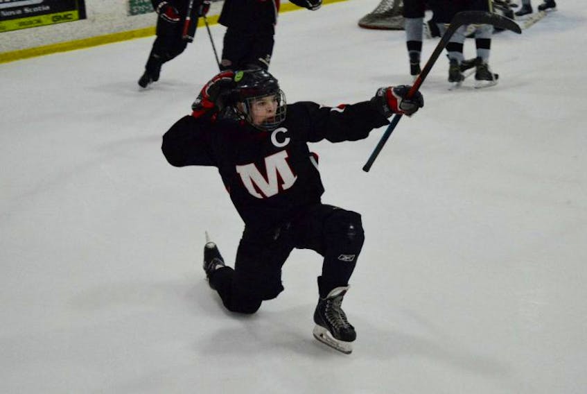 Matthew MacIntosh of the Glace Bay Miners celebrates after completing a hat trick during Nova Scotia Bantam ‘AA’ Provincial Championships action on Friday at the Bayplex in Glace Bay. MacIntosh finished the game with four points, on three goals and an assist. The Miners defeated the Cape Breton West Islanders 6-1.