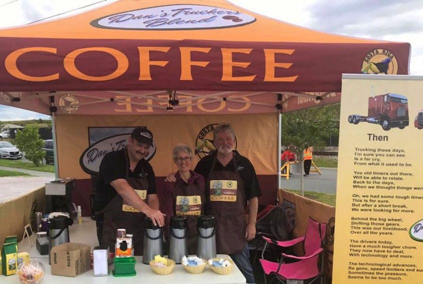 Dan Leslie, right, was joined by his wife Dawn and colleague Kevin MacDonald of Kevin’s Courier during the recent Touch a Truck event at Open Hearth Park in Sydney, where some of the proceeds from coffee they sold supported the Children's Wish Foundation. Leslie, who lives in L’Ardoise, Richmond County has combined three of his loves — trucking, coffee and Costa Rica — and began importing fair trade coffee beans, roasting them and selling them under the Dan’s Truckers Blend brand.