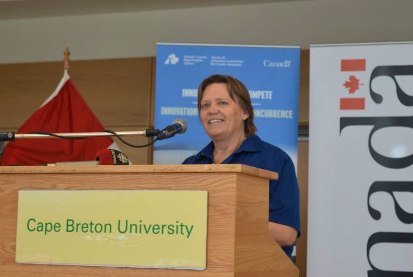 Beth Mason, interim CEO OF CBU’s Verschuren Centre, discusses a project at the centre that will receive a, ACOA grant of almost $750,000 to convert underused seafood and agri-food processing waste during an announcement at the centre Wednesday.