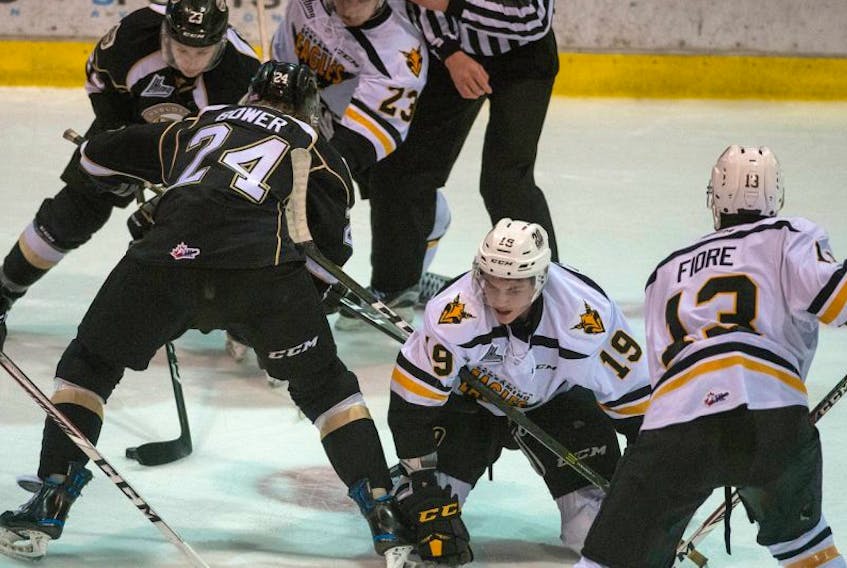 William Bower of the Charlottetown Islanders pulls down Drake Batherson of the Cape Breton Screaming Eagles during QMJHL playoff action at the Eastlink Centre in Charlottetown, Saturday. The teams meet again Tuesday night for Game 3 at Centre 200.