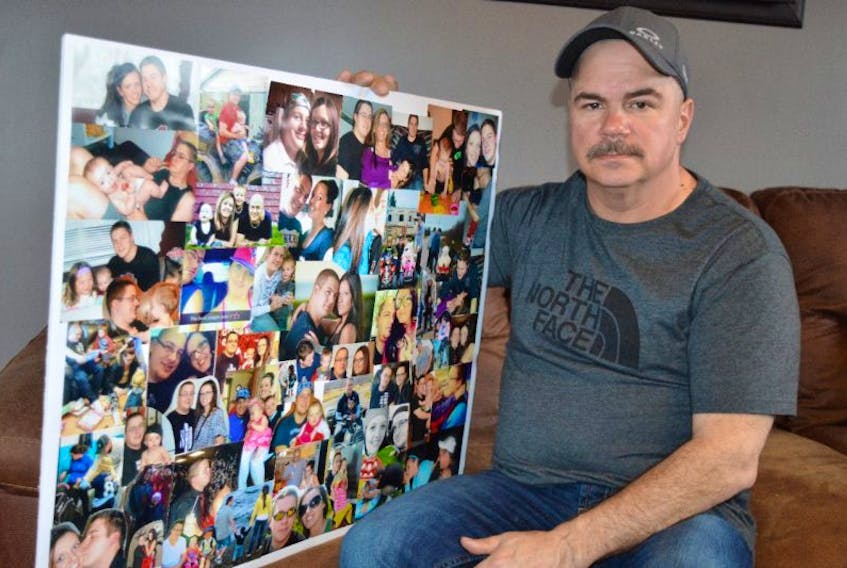 Michael Webber of River Ryan holds a collage of photos of his son Evan, 29, shown with family and friends. The collage was put together for his funeral which is being held Thursday. Michael said his son his son needed help that he couldn’t get and died of a drug overdose on Saturday. He said the problem isn’t with professionals in the health-care system as they work hard with what they have but rather with the system in Cape Breton itself.