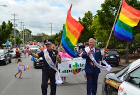 Cape Breton Regional Police Chief Peter McIsaac, left, and CBRM Mayor Cecil Clarke are shown as the grand marshalls for the Pride Cape Breton parade in this file photo from last year’s event. Cape Breton Regional Police will participate in the parade once again this year.